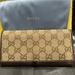 Gucci Bags | Gucci Euc Monogram Gg Leather/Canvas Wallet Supreme Gg Long Flap Wallet + Chain | Color: Brown/Tan | Size: Os