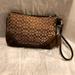 Coach Bags | Coach Signature Small C Monogram Wristlet W/ Suede & Leather Brown 6.5 X 4.25 | Color: Brown/Tan | Size: Os