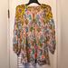 Anthropologie Tops | Anthropologie Maureen Babydoll Ikat Floral Boho Flowing Tunic Top | Color: Cream/Orange | Size: M