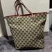 Gucci Bags | Gucci Signature Print Canvas Tote With Red Leather Handles And Trim. | Color: Black/Tan | Size: Os