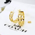 Coach Jewelry | Coach Signature Openwork Hoop Earrings Gold Tone | Color: Gold | Size: Os