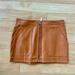 Free People Skirts | Free People Cognac Faux Leather Mini Skirt | Color: Tan | Size: 2