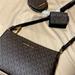 Michael Kors Bags | Michael Kors Jet Set Small Crossbody Bag Tech Attached Mk Brown Black | Color: Black/Brown | Size: Os