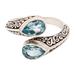 Two Marvels,'Sterling Silver Wrap Ring with Two Faceted Blue Topaz Stones'