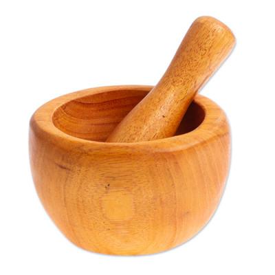 'Mortar and Pestle Hand-Carved from Mahogany Wood in Mexico'