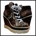 Jessica Simpson Shoes | Jessica Simpson Nwot Meliney Wedge Sneaker Animal Print Size 8.5m | Color: Black/Brown | Size: 8.5