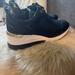 Michael Kors Shoes | Michael Kors Black Gold Sneakers Size 10 | Color: Black/Gold | Size: 10