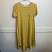 Lularoe Dresses | Lularoe Yellow Pocket T-Shirt Carly Dress | Color: Yellow | Size: Xs