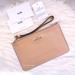 Coach Bags | Nwt Coach Small Wristlet In Patent Leather Beechwood Nude F32014 | Color: Cream/Tan | Size: Os