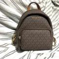 Michael Kors Bags | Michael Kors Monogram Small Mini Brown Leather Backpack Crossbody | Color: Brown/Tan | Size: Os