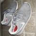 Nike Shoes | Gray And White Nike Women's Tanjun Running Shoes 8.5 | Color: Gray/White | Size: 8.5