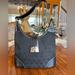 Dooney & Bourke Bags | Dooney & Bourke Black On Black Signature Handbag | Color: Black | Size: Os