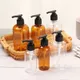 Récipient à pompe en plastique pour gel douche désinfectant pour les mains fournitures de bain à