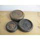 Antique weights. Three cast iron weights - 8oz, 1 lb and 2lb. Round weights for balance scales