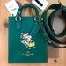 Coach Bags | Disney X Coach North South Mini Tote With Sled Motif | Color: Gold/Green | Size: Os