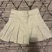 Brandy Melville Skirts | Brandy Melville Cream Pleated Skirt | Color: Cream | Size: M