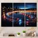 Latitude Run® Bright Lights Big City Nocturnal Cityscape - Abstract Landscape Canvas Art Print Set Metal in Blue/Yellow | Wayfair