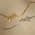 JOWoman-Tour de cou clavicule en acier inoxydable collier nœud papillon boule de fête bijoux
