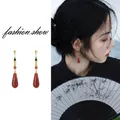 Chinesische Art Hanfu ethnische Ohrringe Mode rote Wasser tropfen Anhänger Ohrclip Schnalle lange