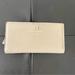 Kate Spade Bags | Kate Spade Camel Pebble Grain Leather Bifold Wallet | Color: Cream/Tan | Size: Size: 4 X 7.5 X 0.75 In