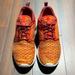 Nike Shoes | Nike Roshe Run Flyknit | Color: Orange/Red | Size: 7