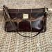 Dooney & Bourke Bags | Euc Dooney & Bourke In Brown And Tan Leather Wristlet/Bag | Color: Brown/Tan | Size: Os