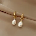 Boucles d'oreilles en perles baroques vintage pour femmes boucles d'oreilles nouées irrégulières