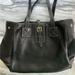 Dooney & Bourke Bags | Dooney And Bourke Black Leather Purse | Color: Black/Red | Size: Os