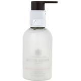 Molton Brown by Molton Brown Delicious Rhubarb & Rose Hand Lotion --100ml/3.3oz