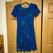 Lularoe Dresses | Lularoe Blue Dress With Flowers. | Color: Blue | Size: M