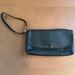 Coach Bags | Coach Wristlet Wallet In Black Leather And Beautiful Teal Lining. Snap Close | Color: Black/Blue | Size: 9” X 4.5”