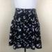 American Eagle Outfitters Skirts | American Eagle Outfitters Black Floral Circle Skater Skirt - Size Large | Color: Black/Purple | Size: L