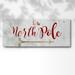 The Holiday Aisle® North Pole Premium Gallery Wrapped Canvas - Ready To Hang Canvas, Solid Wood in White | 12" H x 30" W x 1.5" D | Wayfair