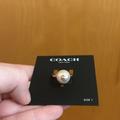 Coach Jewelry | Coach Woman’s Faux Pearl Goldtone Ring Size 7 Nwt | Color: Gold/White | Size: 7