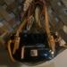 Dooney & Bourke Bags | Dooney & Bourke Patent Leather Small Black Nina Bag | Color: Black/Tan | Size: Os