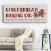 The Holiday Aisle® Gingerbread Baking Co On Canvas Textual Art Canvas, Solid Wood in Brown/Red/White | 12 H x 30 W x 1.5 D in | Wayfair