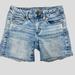 American Eagle Outfitters Shorts | American Eagle Aeo Midi Super Super Stretchy Jean Shorts Frayed Hem Blue Women 4 | Color: Blue | Size: 4