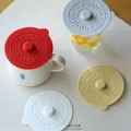 Couvercle de tasse en verre en silicone avec poignée convexe couvercle de protection chaleur