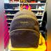 Michael Kors Bags | Guc And Very Clean Signature Michael Kors “Abbey” Backpack | Color: Brown/Tan | Size: Os