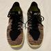 Nike Shoes | Black & Yellow Nike Free Sneakers Size Men's 9.5m/Women's 10.5m | Color: Black/Yellow | Size: 10.5