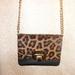 Michael Kors Bags | Michael Kors Tina Black & Brown Saffiano Leather And Calf Hair Cross Body Bag | Color: Black/Gold | Size: Os