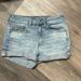 American Eagle Outfitters Shorts | American Eagle Light Wash Blue Denim High Rise Shortie Jean Shorts 8 | Color: Blue | Size: 8