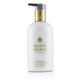 Molton Brown Mesmerising Oudh Accord & Gold Body Lotion - 300ml/10oz Indulge in the Luxurious Fragrance of Mesmerising Oudh Accord & Gold