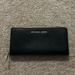 Michael Kors Bags | Michael Kors Wallet | Color: Black/Gold | Size: Os