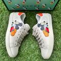 Gucci Shoes | Gucci X Disney Ace 602129 Ivory Leather Mickey Mouse Ace Sneakers Women 36 | Color: Orange/White | Size: 36eu