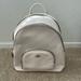 Coach Bags | Coach Cream Colored Backpack. 3 Pockets (2 Big, 1 Small) | Color: Cream | Size: Os