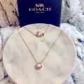 Coach Jewelry | Coach Open Circle Stone Necklace | Color: Gold/Pink | Size: Os