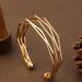Anthropologie Jewelry | 14k Gold Filled Bangle Bracelet | Color: Gold/Red | Size: Os
