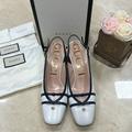 Gucci Shoes | Gucci Gold Heel Slingback Shoe Adorned With Navy Blue Leather Trim And Bows Us 8 | Color: Blue/White | Size: 8