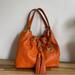 Michael Kors Bags | Michael Michael Kors Orange Leather Camden Drawstring Shoulder Bag | Color: Orange | Size: 16” X 12”